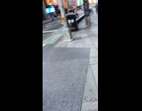 Guy lifts curls metal barrier times square 