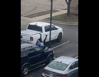 Woman on the car hood tiktok dance at the parking lot