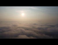 Submitter films drone above fog