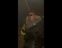 Guy sleeps upright in sleeping bag 