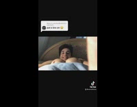 Guy in bed recording from an angle that looks like he has breasts 