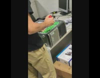 Guy stabs computer with red screwdriver class