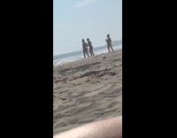 Bikini girl boxes punches air at beach 