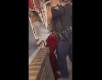 Red pants girl gets detained arrested cop