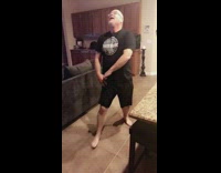 Dad catches flipped bottle upright in shorts pocket 