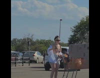 Woman unbuttoned shirt take selfie box shopping cart