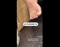 Zoom in to feet of train passenger