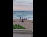 Four women bikini dress dance line beach